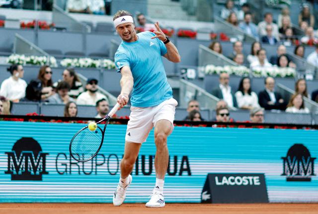 Germany's Alexander Zverev returns the ball to Belgium's Alexander Blockx during their 2026 ATP Tour Madrid Open tennis tournament semi-final singles match at the Caja Magica in Madrid, on May 1, 2026. (Photo by OSCAR DEL POZO / AFP)