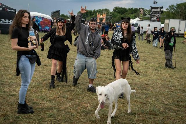 Revellers take part in a Rave Party at a military site in Cornusse, near Bourges, central France on May 1, 2026. Around 20,000 partygoers gathered on May 1, 2026, at a military site near Bourges – described by the authorities as "extremely dangerous" – to take part in a rave party, against a backdrop of tougher legislation targeting these illegal techno gatherings. (Photo by ARNAUD FINISTRE / AFP)