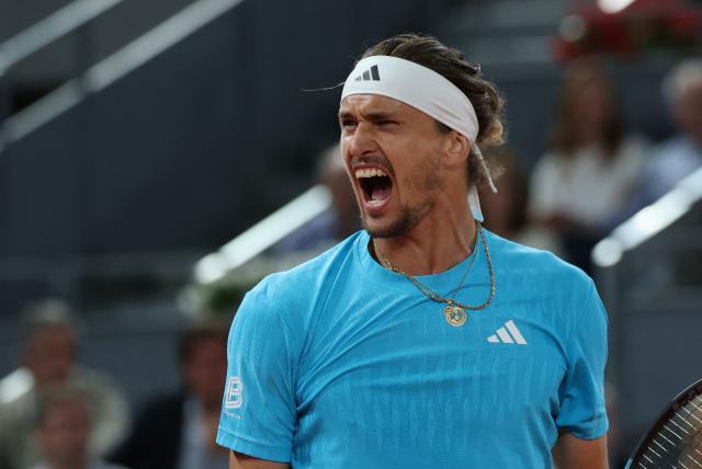 Germany's Alexander Zverev celebrates beating Belgium's Alexander Blockx during their 2026 ATP Tour Madrid Open tennis tournament semi-final singles match at the Caja Magica in Madrid, on May 1, 2026. (Photo by Thomas COEX / AFP)