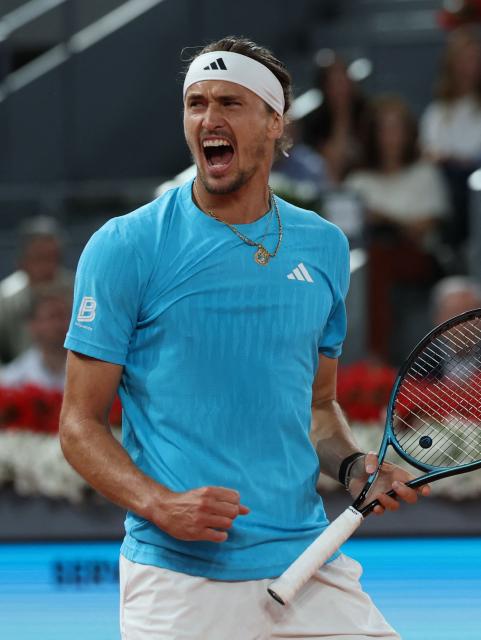 Germany's Alexander Zverev celebrates beating Belgium's Alexander Blockx during their 2026 ATP Tour Madrid Open tennis tournament semi-final singles match at the Caja Magica in Madrid, on May 1, 2026. (Photo by Thomas COEX / AFP)
