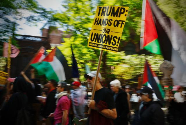 Demonstrators attend a May Day rally marking International Workers' Day in New York, on May 1, 2026. (Photo by Kena Betancur / AFP)