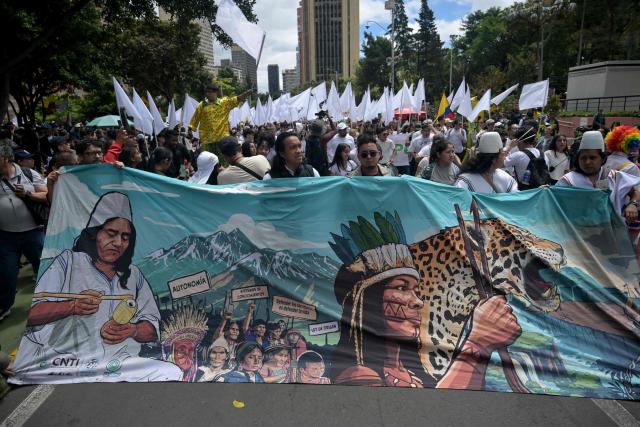 Supporters of Colombia's presidential candidate from the ruling party Pacto Historico, Ivan Cepeda, take part in a May Day rally marking International Workers Day in Bogota on May 1, 2026. (Photo by Raul ARBOLEDA / AFP)