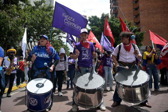 Supporters of Colombia's presidential candidate from the ruling party Pacto Historico, Ivan Cepeda, take part in a May Day rally marking International Workers Day in Bogota on May 1, 2026. (Photo by Raul ARBOLEDA / AFP)