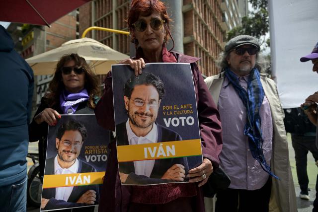 Supporters of Colombia's presidential candidate from the ruling party Pacto Historico, Ivan Cepeda, take part in a May Day rally marking International Workers Day in Bogota on May 1, 2026. (Photo by Raul ARBOLEDA / AFP)