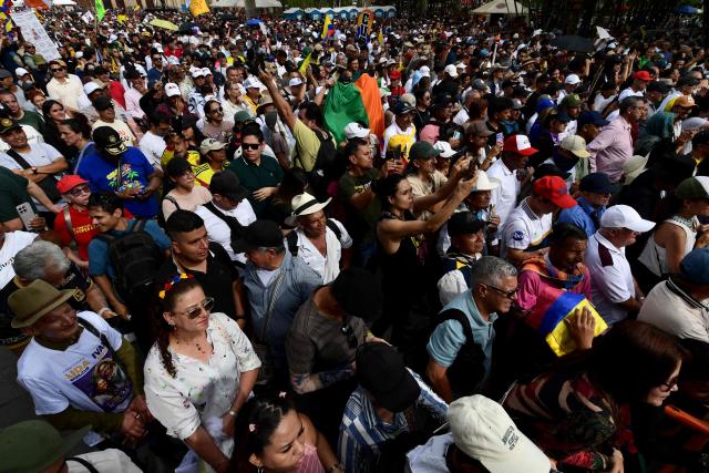 Supporters of Colombia's President Gustavo Petro attend a rally marking International Workers Day, in Medellin, Antioquia department, Colombia, on May 1, 2026. (Photo by Jaime SALDARRIAGA / AFP)