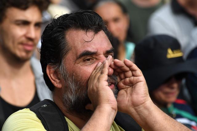 A supporter of Colombia's President Gustavo Petro shouts slogans during a rally marking International Workers Day in Medellin, Antioquia department, Colombia, on May 1, 2026. (Photo by Jaime SALDARRIAGA / AFP)