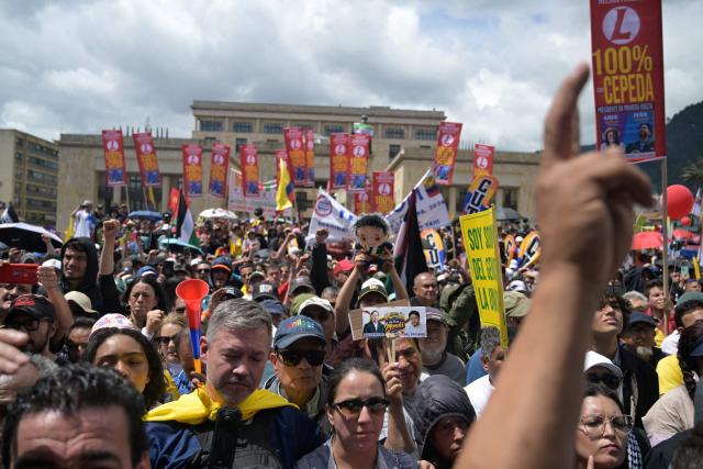 Supporters of Colombia's presidential candidate from the ruling party Pacto Historico, Ivan Cepeda, take part in a May Day rally marking International Workers Day in Bogota on May 1, 2026. (Photo by Raul ARBOLEDA / AFP)
