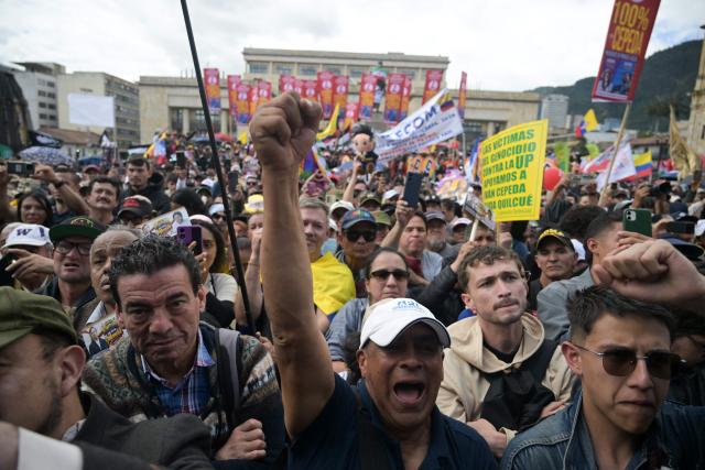 Supporters of Colombia's presidential candidate from the ruling party Pacto Historico, Ivan Cepeda, take part in a May Day rally marking International Workers Day in Bogota on May 1, 2026. (Photo by Raul ARBOLEDA / AFP)