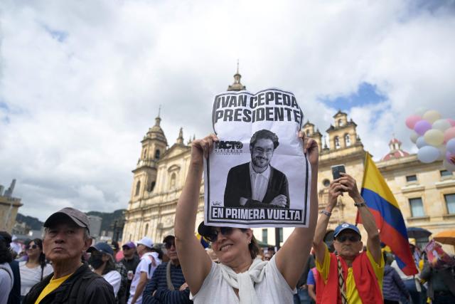 Supporters of Colombia's presidential candidate from the ruling party Pacto Historico, Ivan Cepeda, take part in a May Day rally marking International Workers Day in Bogota on May 1, 2026. (Photo by Raul ARBOLEDA / AFP)