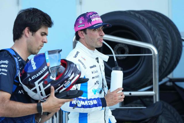 Williams' Spanish driver Carlos Sainz walks near pit lane after Sprint qualifying ahead of the 2026 Miami Formula One Grand Prix at Miami International Autodrome in Miami Gardens, Florida, on May 1, 2026. (Photo by Lynne Sladky / POOL / AFP)