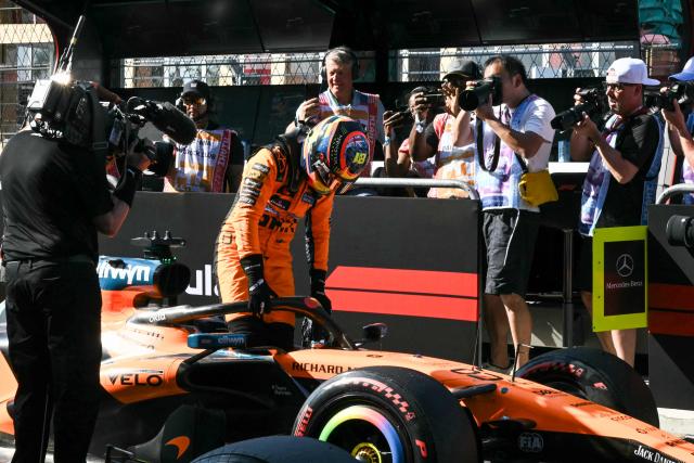 McLaren's Australian driver Oscar Piastri exits his car after finishing in the third position in Sprint qualifying ahead of the 2026 Miami Formula One Grand Prix at Miami International Autodrome in Miami Gardens, Florida, on May 1, 2026. (Photo by CHANDAN KHANNA / AFP)