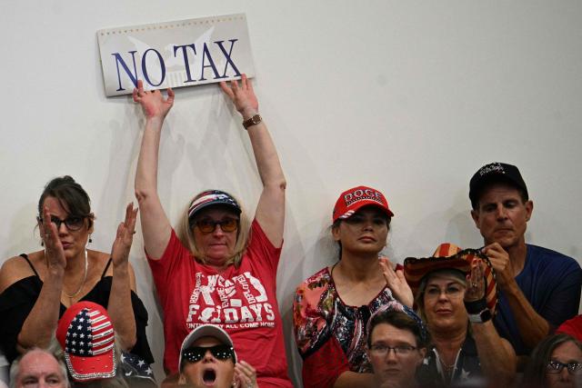 People react as US President Donald Trump speaks about taxes and Social Security in The Villages, Florida, on May 1, 2026. (Photo by Jim WATSON / AFP)