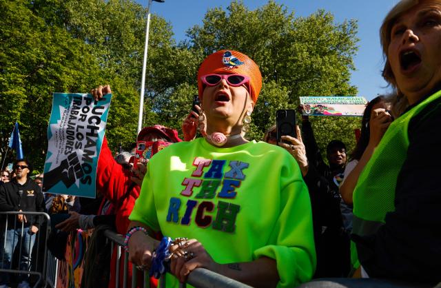 People shout slogans during a May Day rally marking International Workers' Day in New York, on May 1, 2026. (Photo by kena betancur / AFP)