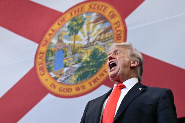 US President Donald Trump cheers supporters after speaking about taxes and Social Security in The Villages, Florida, on May 1, 2026. (Photo by Jim WATSON / AFP)