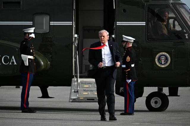 US President Donald Trump steps off Marine One after landing at Ocala International Airport, in Ocala, Florida on May 1, 2026, after giving a speech about taxes and Social Security at The Villages. (Photo by Jim WATSON / AFP)