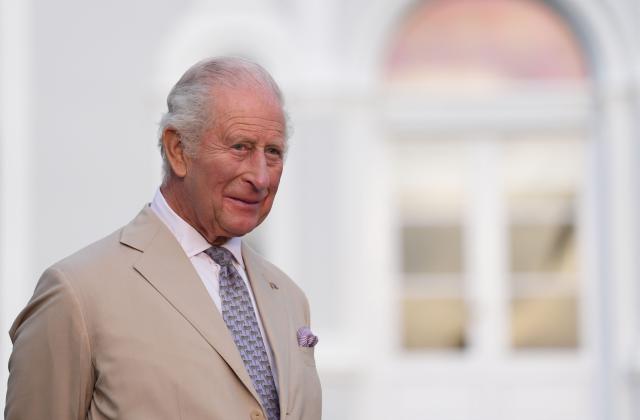 Britain's King Charles III looks on after delivering remarks during a garden party at the Government House in Hamilton, Bermuda, on May 1, 2026. King Charles III is in Bermuda for his first visit to a British Overseas Territory as Sovereign. (Photo by Yui Mok / POOL / AFP)