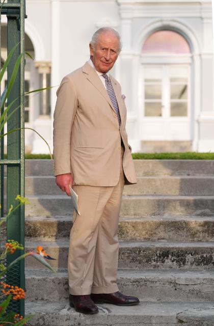 Britain's King Charles III looks on after delivering remarks during a garden party at the Government House in Hamilton, Bermuda, on May 1, 2026. King Charles III is in Bermuda for his first visit to a British Overseas Territory as Sovereign. (Photo by Yui Mok / POOL / AFP)