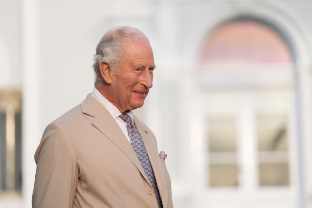 Britain's King Charles III looks on after delivering remarks during a garden party at the Government House in Hamilton, Bermuda, on May 1, 2026. King Charles III is in Bermuda for his first visit to a British Overseas Territory as Sovereign. (Photo by Yui Mok / POOL / AFP)