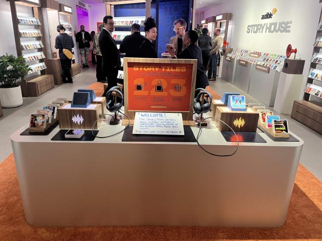 Customers shop at the Audible Story House in New York, on April 30, 2026. The pop-up store labeled as a "bookless bookstore" is dedicated to audiobooks. (Photo by Thomas URBAIN / AFP)