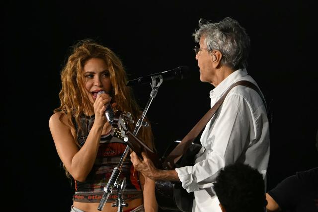 Colombian singer Shakira (L) and Brazilian singer Caetano Veloso perform during a rehearsal at Copacabana Beach in Rio de Janeiro, Brazil, on May 1, 2026. The Colombian singer is scheduled to perform on May 2. (Photo by Mauro PIMENTEL / AFP)