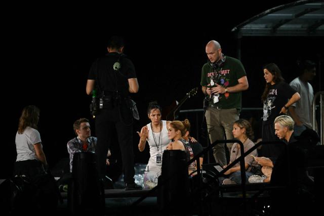 Colombian singer Shakira (C) meets with her team during a rehearsal at Copacabana Beach in Rio de Janeiro, Brazil, on May 1, 2026. The Colombian singer is scheduled to perform on May 2. (Photo by Mauro PIMENTEL / AFP)