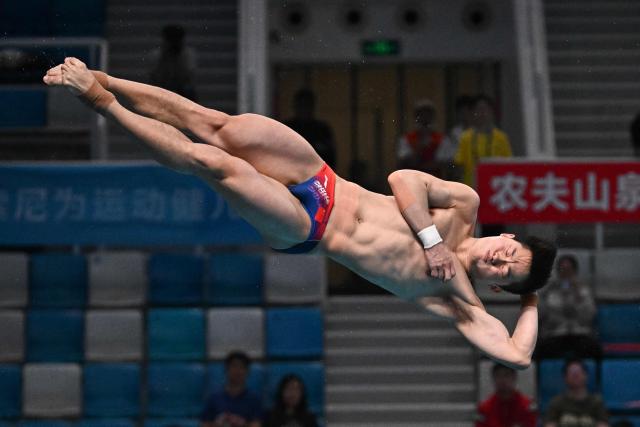 China’s Wang Zongyuan competes in the menґs 3m springboard event at the World Aquatics Diving World Cup Super Finals in Beijing on May 2, 2026. (Photo by Pedro PARDO / AFP)