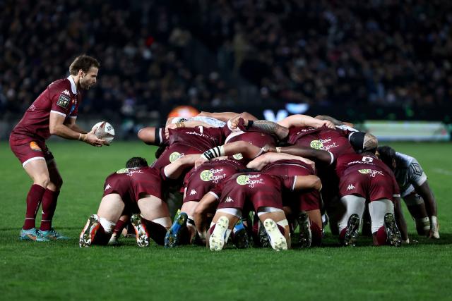 (FILES) Bordeaux-Bègles' French scrum-half Yann Lesgourgues (l) looks the scrum during the French Top14 rugby union match between Union Bordeaux-Begles (UBB) and ASM Clermont at the Chaban-Delmas Stadium in Bordeaux, south-western France on February 23, 2025. Struggling in the Top 14, where they are coming off a defeat, Bordeaux-Bègles will play a good part of their season on May 3, 2026 in the Champions Cup, their favorite competition for the last two years, by hosting Bath in the semi-finals, an English team with happy memories in Gironde. (Photo by ROMAIN PERROCHEAU / AFP)