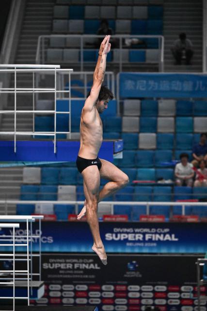France´s Jules Bouyer competes in the men´s 3m springboard event at the World Aquatics Diving World Cup Super Finals in Beijing on May 2, 2026. (Photo by Pedro PARDO / AFP)