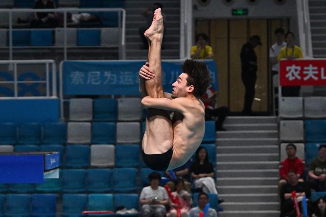 France´s Jules Bouyer competes in the men´s 3m springboard event at the World Aquatics Diving World Cup Super Finals in Beijing on May 2, 2026. (Photo by Pedro PARDO / AFP)