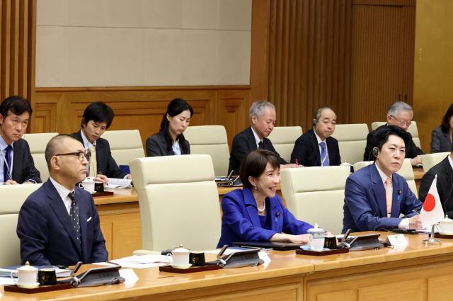 Japan's Prime Minister Sanae Takaichi (L) attends a meeting with Vietnam's Prime Minister Le Minh Hung in Hanoi on May 2, 2026. (Photo by Hoang Long / AFP)