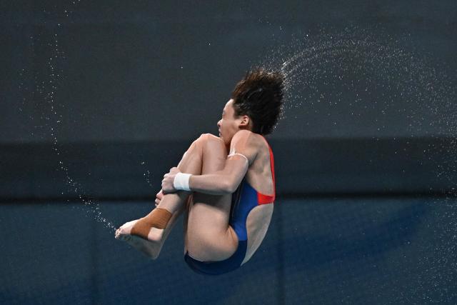 China’s Jiang Linjing competes in the the women’s 10m platform event at the World Aquatics Diving World Cup Super Finals in Beijing on May 2, 2026. (Photo by Pedro PARDO / AFP)