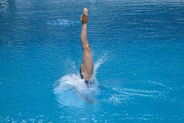 China’s Jiang Linjing competes in the the women’s 10m platform event at the World Aquatics Diving World Cup Super Finals in Beijing on May 2, 2026. (Photo by Pedro PARDO / AFP)
