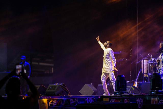 Senegalese singer and artist Youssou N’Dour performs during the 18th Anoumabo Urban Music Festival (FEMUA) in Abidjan on May 1, 2026. (Photo by Chris Boli / AFP)
