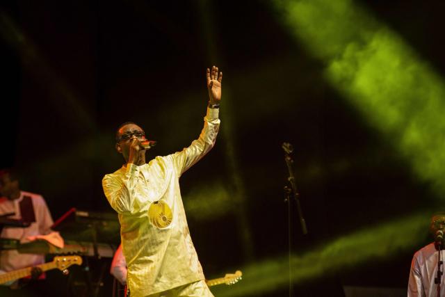 Senegalese singer and artist Youssou N’Dour performs during the 18th Anoumabo Urban Music Festival (FEMUA) in Abidjan on May 1, 2026. (Photo by Chris Boli / AFP)