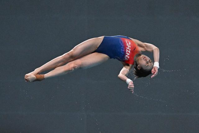 China’s Jiang Linjing competes in the the women’s 10m platform event at the World Aquatics Diving World Cup Super Finals in Beijing on May 2, 2026. (Photo by Pedro PARDO / AFP)