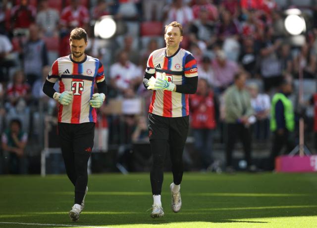 Bayern Munich's German goalkeeper #26 Sven Ulreich (L) and Bayern Munich's German goalkeeper #01 Manuel Neuer warm up ahead the German first division Bundesliga football match between FC Bayern Munich and Heidenheim in Munich on May 2, 2026. (Photo by Alexandra BEIER / AFP) / DFL REGULATIONS PROHIBIT ANY USE OF PHOTOGRAPHS AS IMAGE SEQUENCES AND/OR QUASI-VIDEO