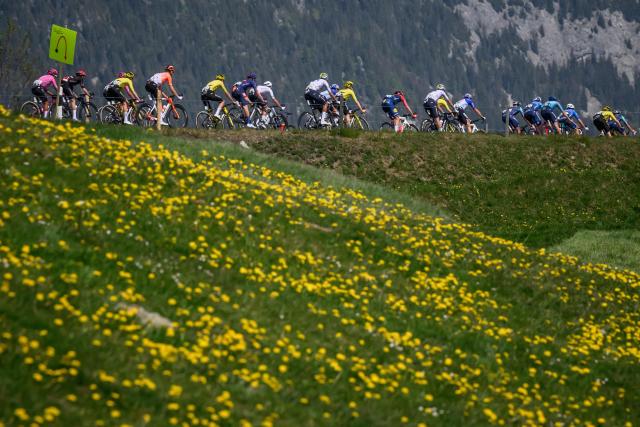 The pack rides the Jaunpass during the fourth stage of the Tour of Romandie UCI cycling World tour, 149.6 km from Broc to Charmey, in Jaunpass, Switzerland, on May 2, 2026. (Photo by Fabrice COFFRINI / AFP)