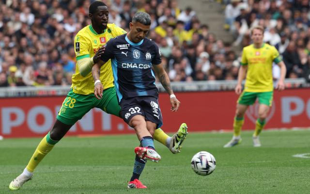 Nantes' Malian midfielder #28 Ibrahima Sissoko fights for the ball with Marseille's Argentinian defender #32 Facundo Medina during the French L1 football match between FC Nantes and Olympique de Marseille at the Stade de la Beaujoire–Louis Fonteneau in Nantes, western France on May 2, 2026. (Photo by Fred TANNEAU / AFP)
