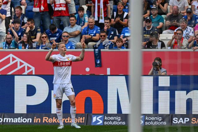 Stuttgart's German midfielder #10 Chris Fuehrich (C) celebrates his 1-1 during the German first division Bundesliga football match between TSG Hoffenheim and VfB Stuttgart in Sinsheim, on May 2, 2026. (Photo by THOMAS KIENZLE / AFP) / DFL REGULATIONS PROHIBIT ANY USE OF PHOTOGRAPHS AS IMAGE SEQUENCES AND/OR QUASI-VIDEO