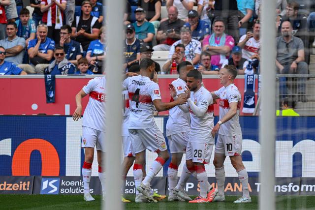 Stuttgart's German midfielder #10 Chris Fuehrich (R) celebrates his 1-1 with team mates during the German first division Bundesliga football match between TSG Hoffenheim and VfB Stuttgart in Sinsheim, on May 2, 2026. (Photo by THOMAS KIENZLE / AFP) / DFL REGULATIONS PROHIBIT ANY USE OF PHOTOGRAPHS AS IMAGE SEQUENCES AND/OR QUASI-VIDEO