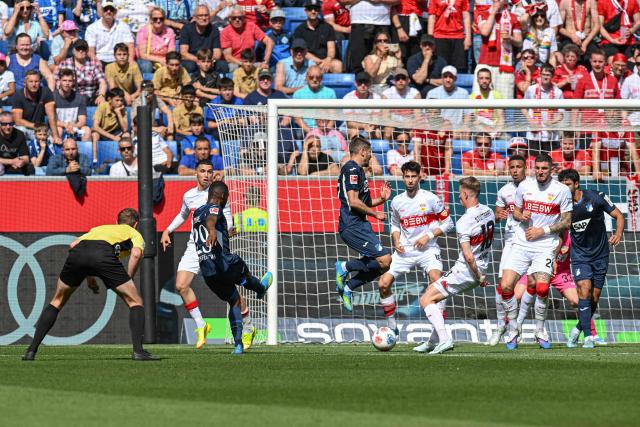 Hoffenheim's Ivorian midfielder #29 Bazoumana Toure (3rd L) shoots the ball to score the 2-1 during the German first division Bundesliga football match between TSG Hoffenheim and VfB Stuttgart in Sinsheim, on May 2, 2026. (Photo by THOMAS KIENZLE / AFP) / DFL REGULATIONS PROHIBIT ANY USE OF PHOTOGRAPHS AS IMAGE SEQUENCES AND/OR QUASI-VIDEO