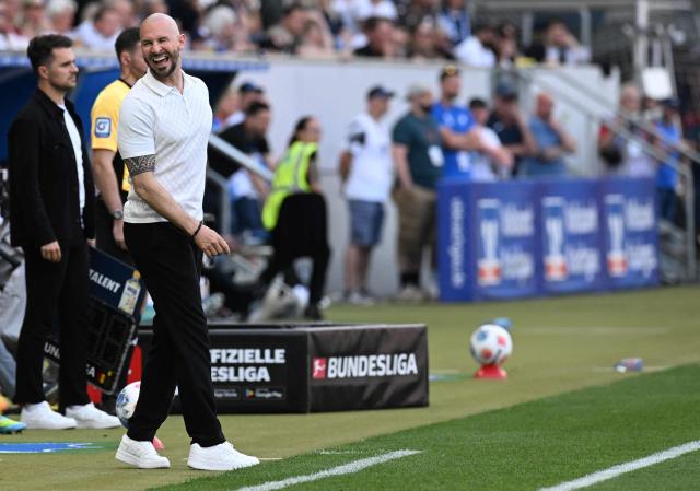 Hoffenheim's Austrian head coach Christian Ilzer reacts during the German first division Bundesliga football match between TSG Hoffenheim and VfB Stuttgart in Sinsheim, on May 2, 2026. (Photo by THOMAS KIENZLE / AFP) / DFL REGULATIONS PROHIBIT ANY USE OF PHOTOGRAPHS AS IMAGE SEQUENCES AND/OR QUASI-VIDEO