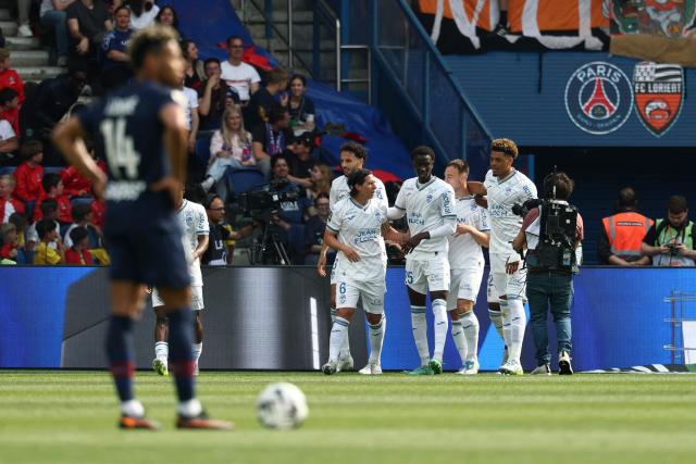 Lorient's French midfielder #10 Pablo Pagis (2ndR) celebrates with teammates after scoring the equalizer during the French L1 football match between Paris Saint-Germain (PSG) and FC Lorient at Parc des Princes stadium in Paris on May 2, 2026. (Photo by FRANCK FIFE / AFP)