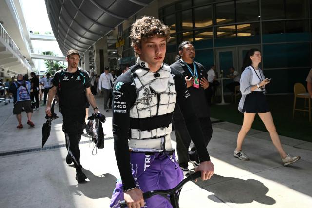 Mercedes' Italian driver Kimi Antonelli rides a scooter as he makes his way from the paddock to the garage ahead of the 2026 Miami Formula One Sprint at Miami International Autodrome in Miami Gardens, Florida, on May 2, 2026. (Photo by CHANDAN KHANNA / AFP)