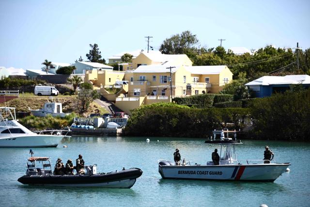 Members of the Bermuda's Coast Guard patrol the area as Britain's King Charles III visits the Great Bay Coast Guard Station in St. David's, Bermuda on May 2, 2026. King Charles III is in Bermuda for his first visit to a British Overseas Territory as Sovereign. (Photo by Henry NICHOLLS / AFP)