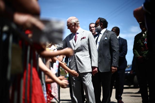 Britain's King Charles III greets members of the public during a visit at the Great Bay Coast Guard Station in St. David's, Bermuda, on May 2, 2026. King Charles III is in Bermuda for his first visit to a British Overseas Territory as Sovereign. (Photo by HENRY NICHOLLS / AFP)