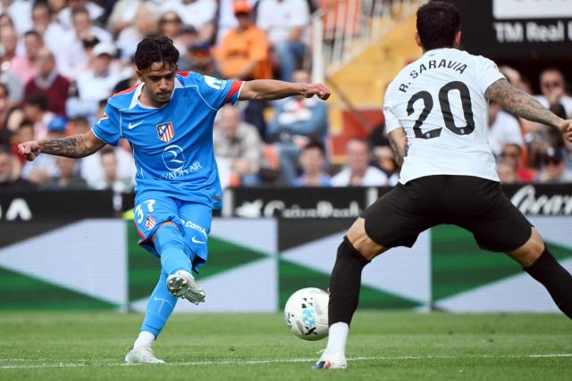 Atletico Madrid's Spanish midfielder #37 Iker Luque scores the opening goal during the Spanish league football match between Valencia CF and Club Atletico de Madrid at Mestalla Stadium in Valencia on May 2, 2026. (Photo by JOSE JORDAN / AFP)
