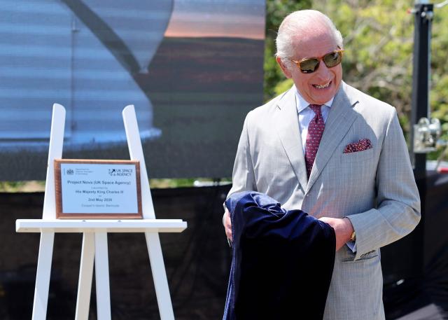 Britain's King Charles III unveils a plaque to officially launch the UK Space Agency’s ‘Project Nova’ at the site of a new UK Space Agency observatory on his final day in Bermuda on Cooper's Island, Bermuda, May 2, 2026. King Charles III is in Bermuda for his first visit to a British Overseas Territory as Sovereign. (Photo by Chris Jackson / POOL / AFP)