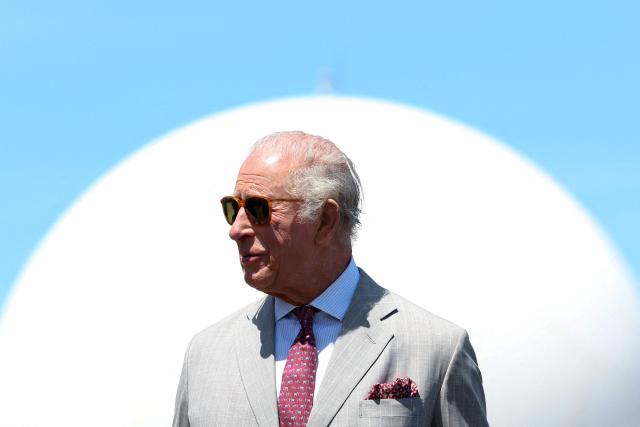 Britain's King Charles unveils a plaque to officially launch the UK Space Agency (UKSA) 'Project Nova', on Cooper's Island, Bermuda, May 2, 2026. King Charles III is in Bermuda for his first visit to a British Overseas Territory as Sovereign. (Photo by Suzanne Plunkett / POOL / AFP)