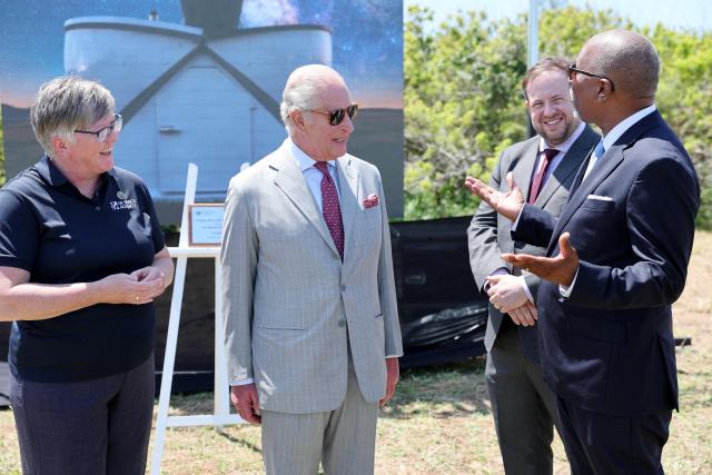 Britain's King Charles III (C) during the launch of the UK Space Agency’s ‘Project Nova’ at the site of a new UK Space Agency observatory on his final day in Bermuda on Cooper's Island, Bermuda, May 2, 2026. King Charles III is in Bermuda for his first visit to a British Overseas Territory as Sovereign. (Photo by Chris Jackson / POOL / AFP)
